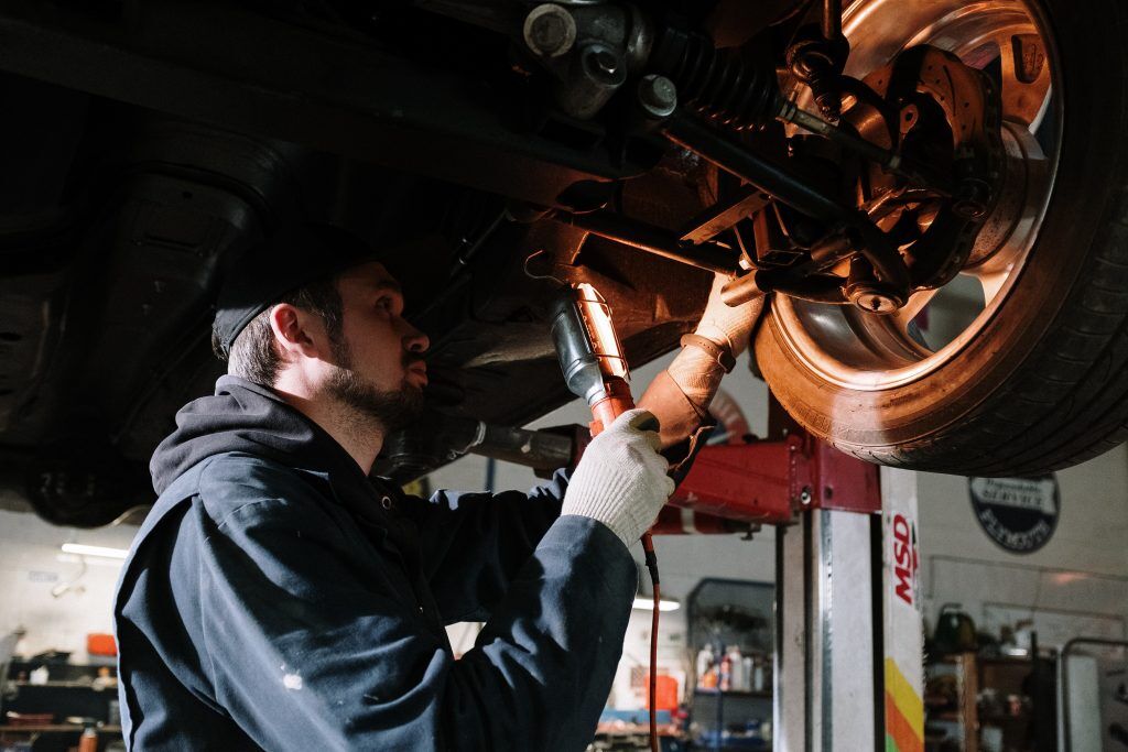 mechanic working on car repair